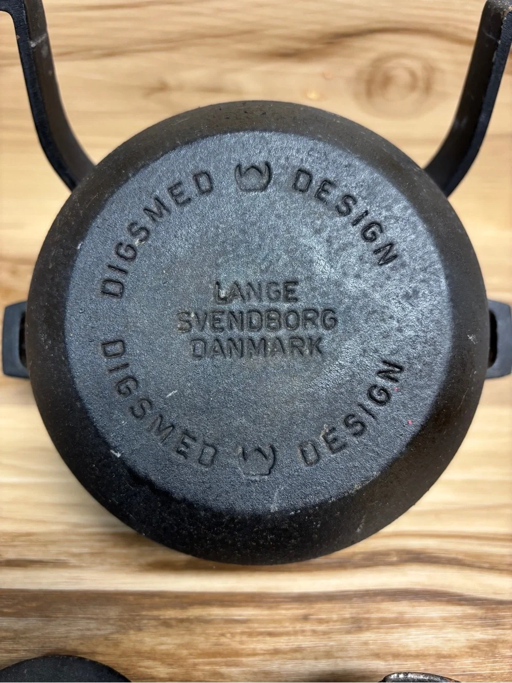 Digsmed Vintage mid-century modern cast iron and teak wood fondue pot.